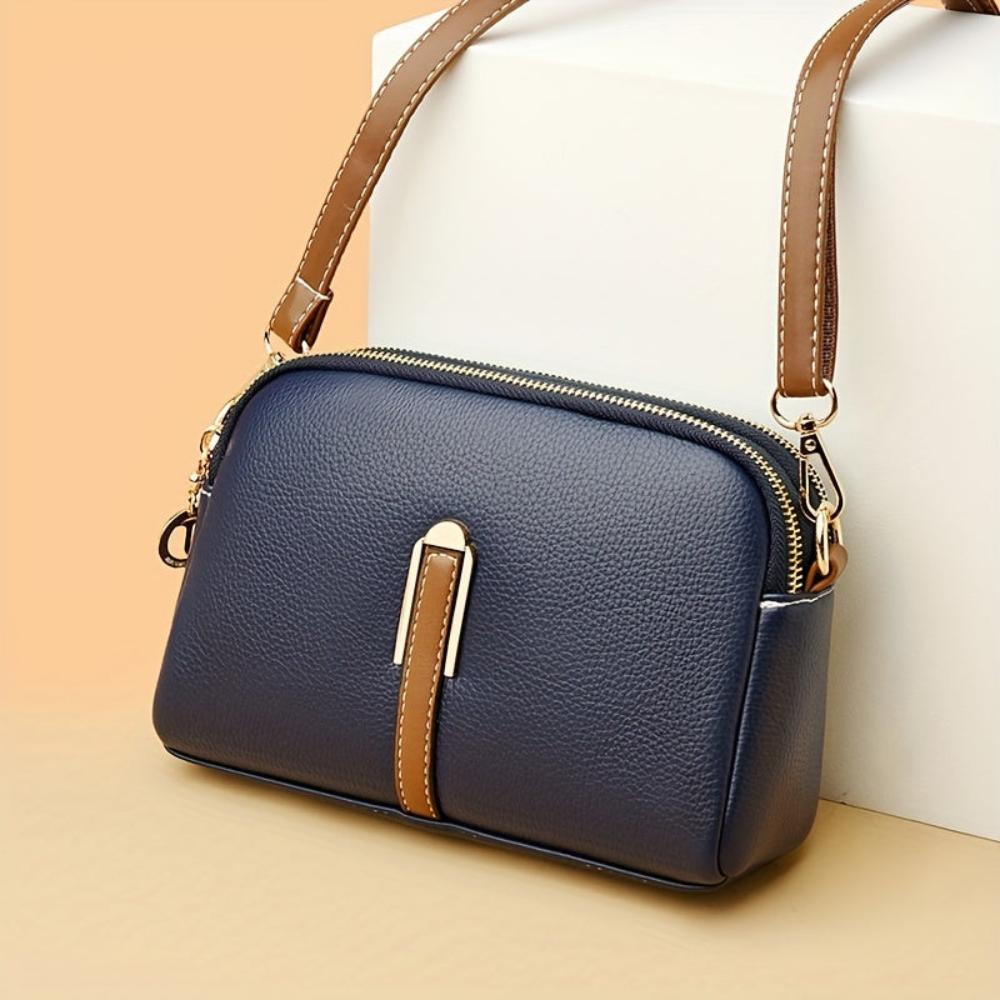 Mila | Sac à bandoulière avec texture lychee